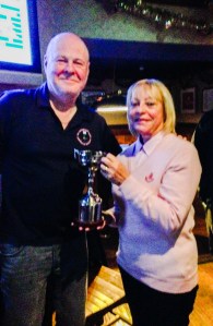 Capt. Simpson presents Elaine Jewson with the Dave McNicoll Cup